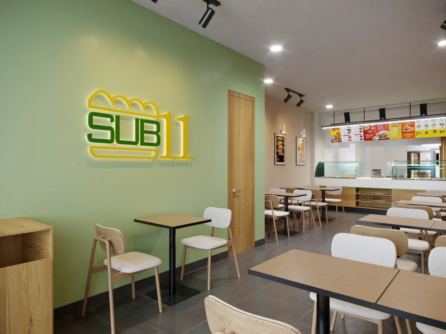 SUB11 store with the green logo wall