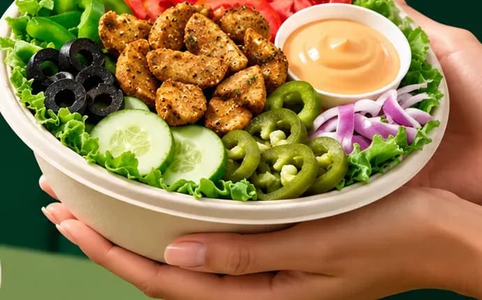 SUB11 salad bowl held in two hands